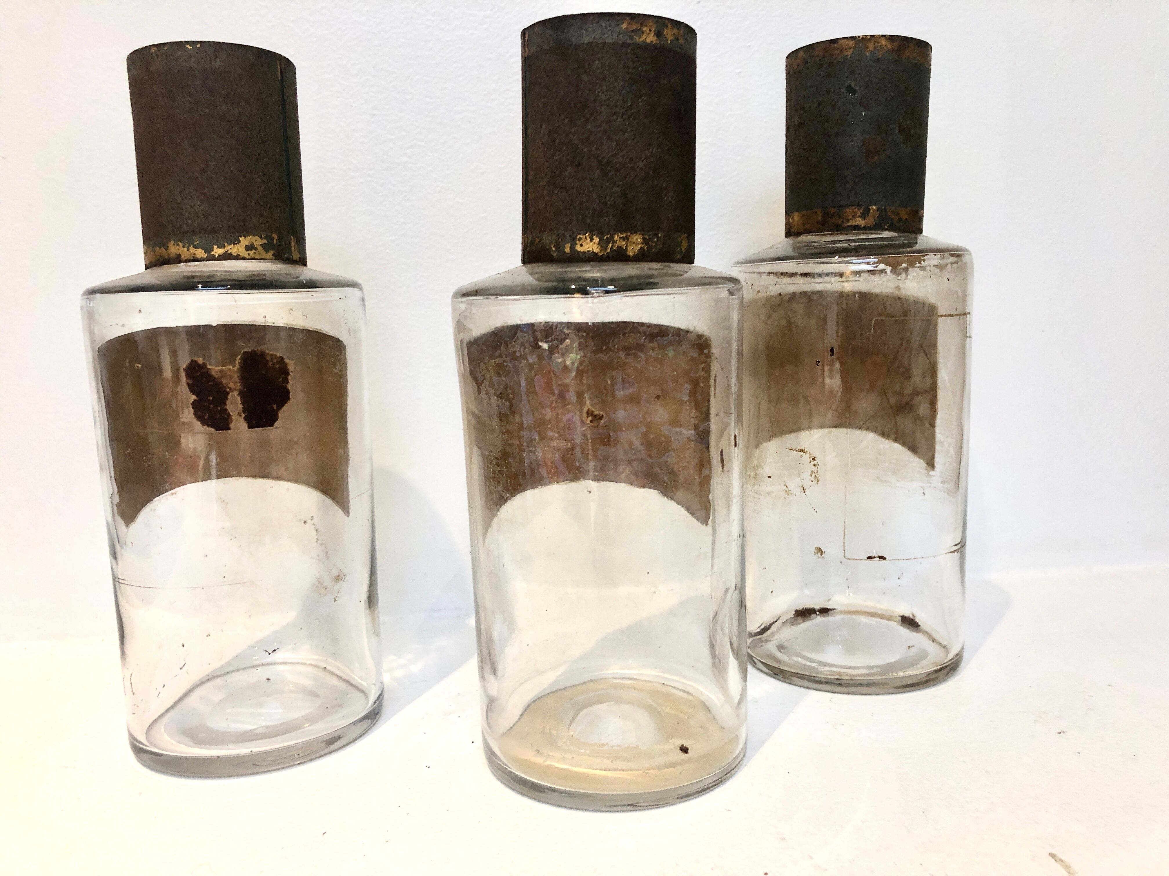Trio apothecary bottles, early 20th