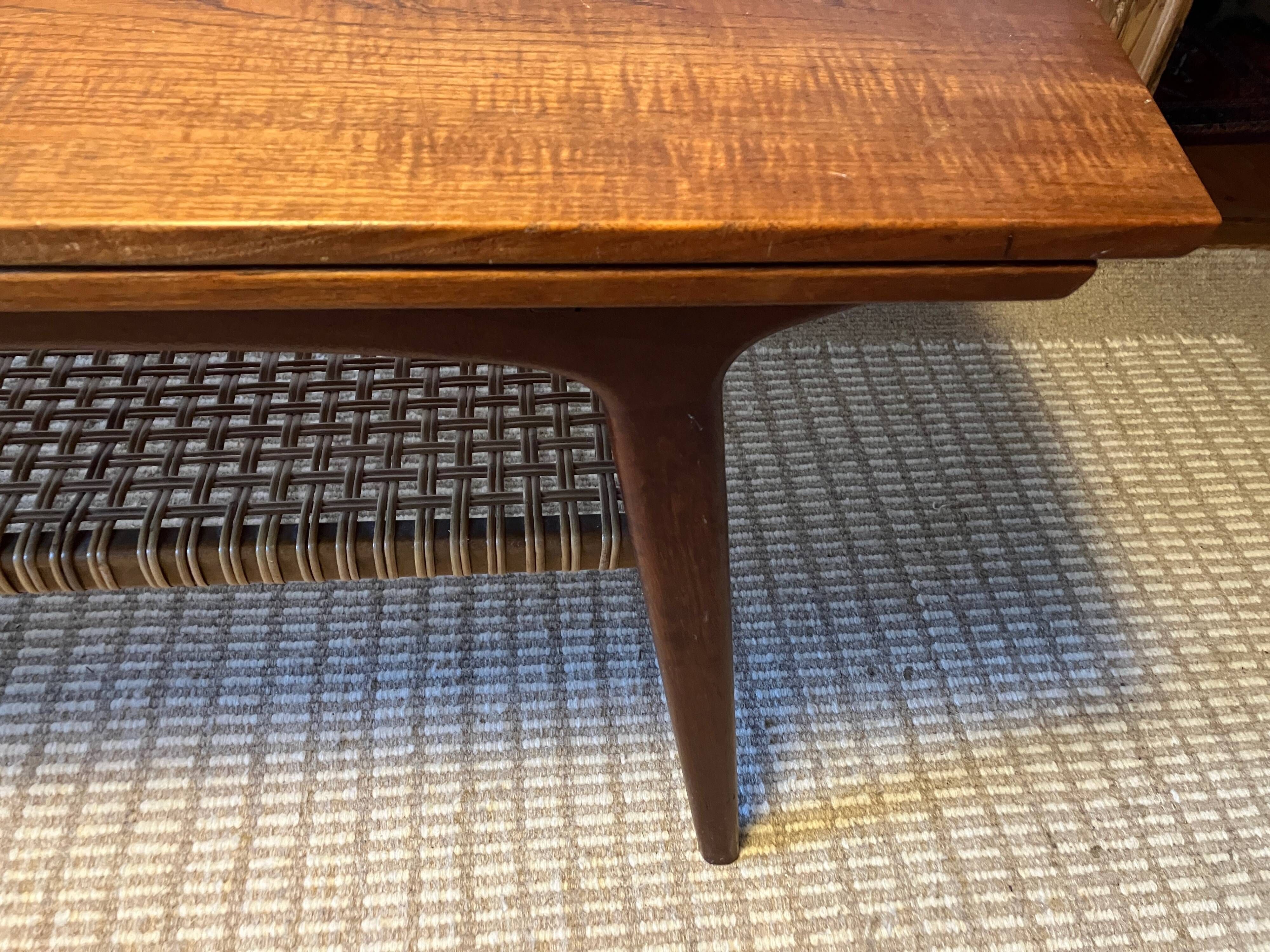 Danish coffee table from the 1960s, in good original condition, teak wood, rattan. by HELTBORG MOBLER