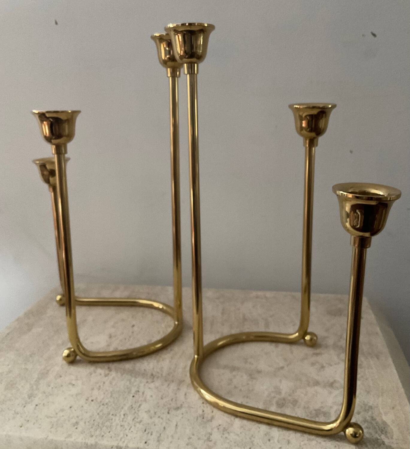 Duo of modernist brass candlesticks
