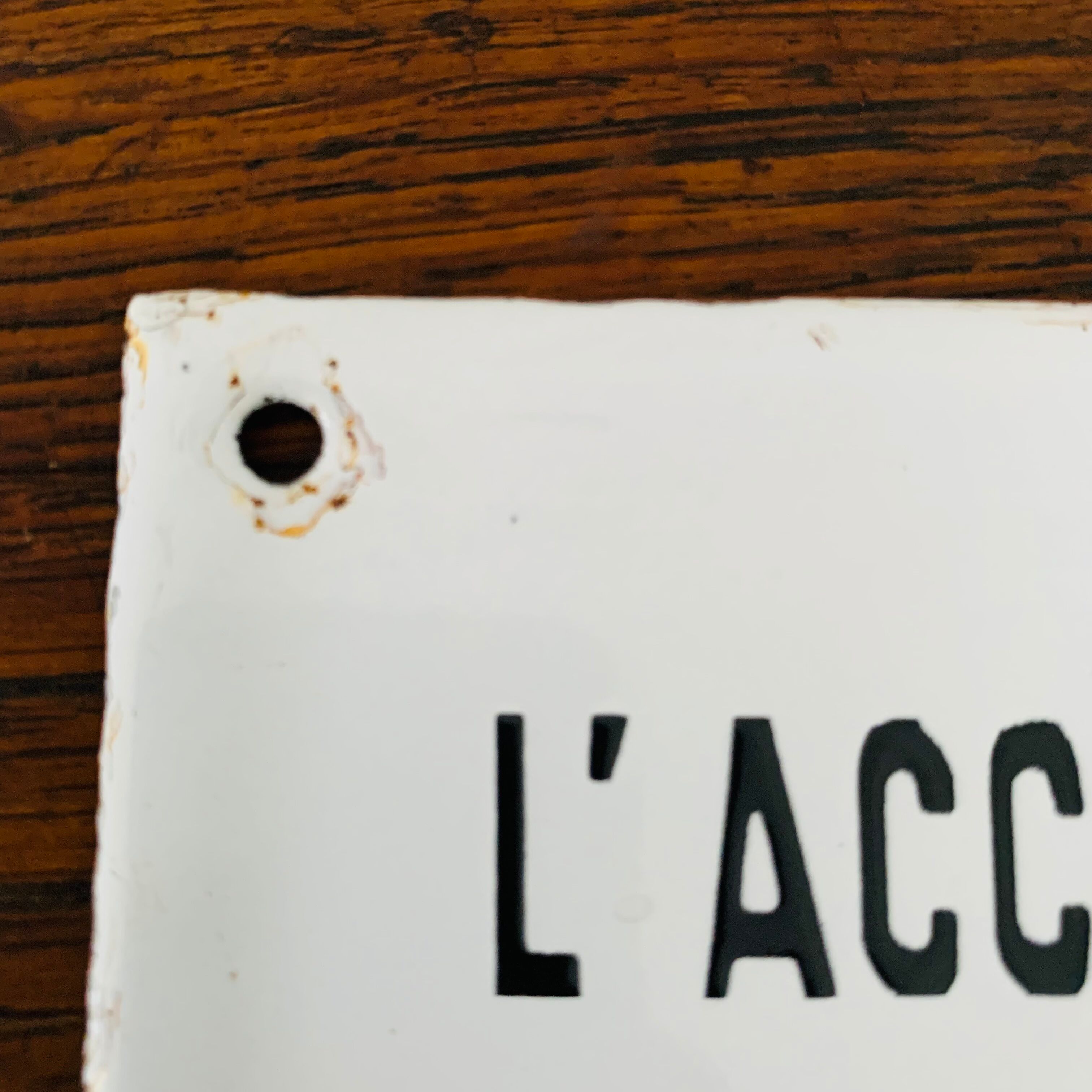 Old enamelled plaque of building