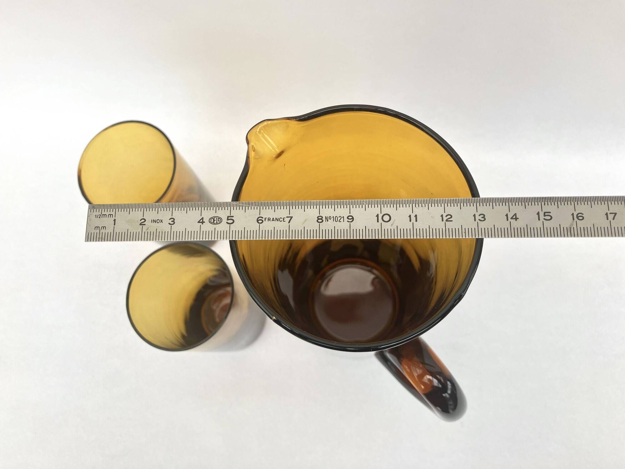 Carafe/pitcher and two amber glasses • Blown glass • France • 1970s