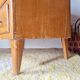 Vintage chest of drawers with tapered legs