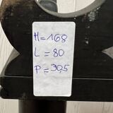 Blackened wooden shelf.