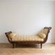 Classic meridian in wood and beige fabric with yellow stripes.