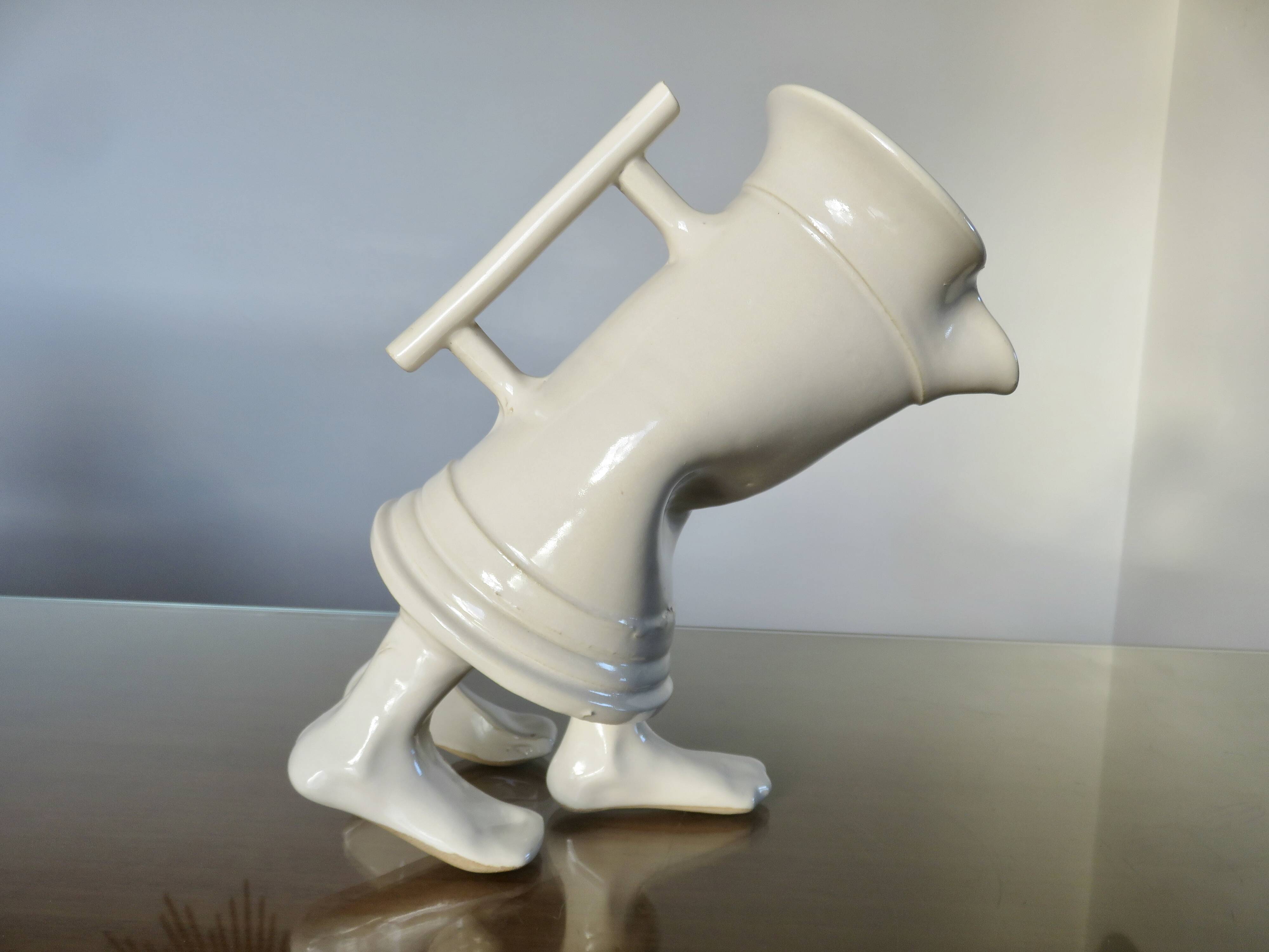 Anthropomorphic jug in slipware