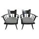 Pair of antique hand-carved armchairs in black lacquer from the 1920s.