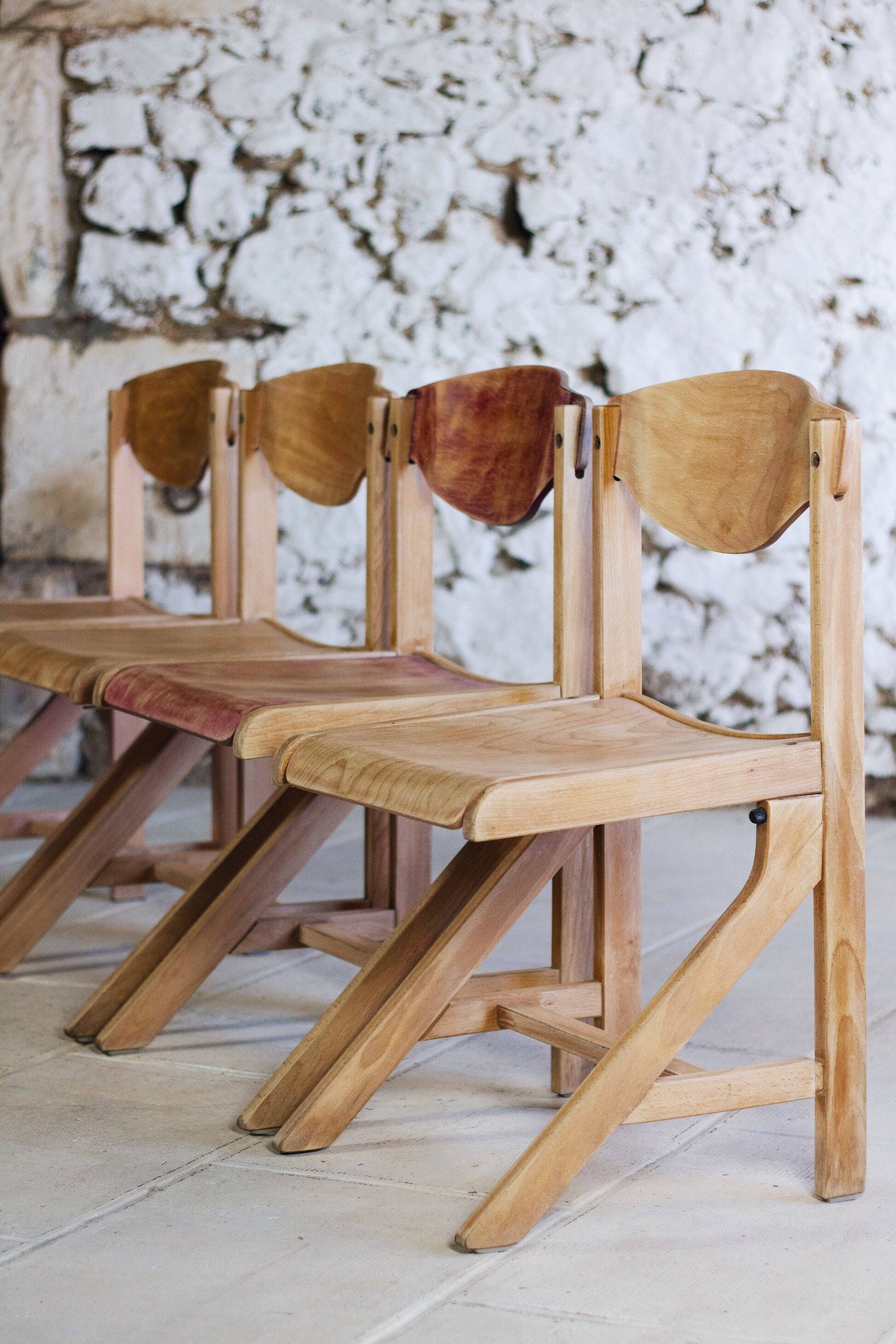 4 vintage canteen chairs in beech, 1980.