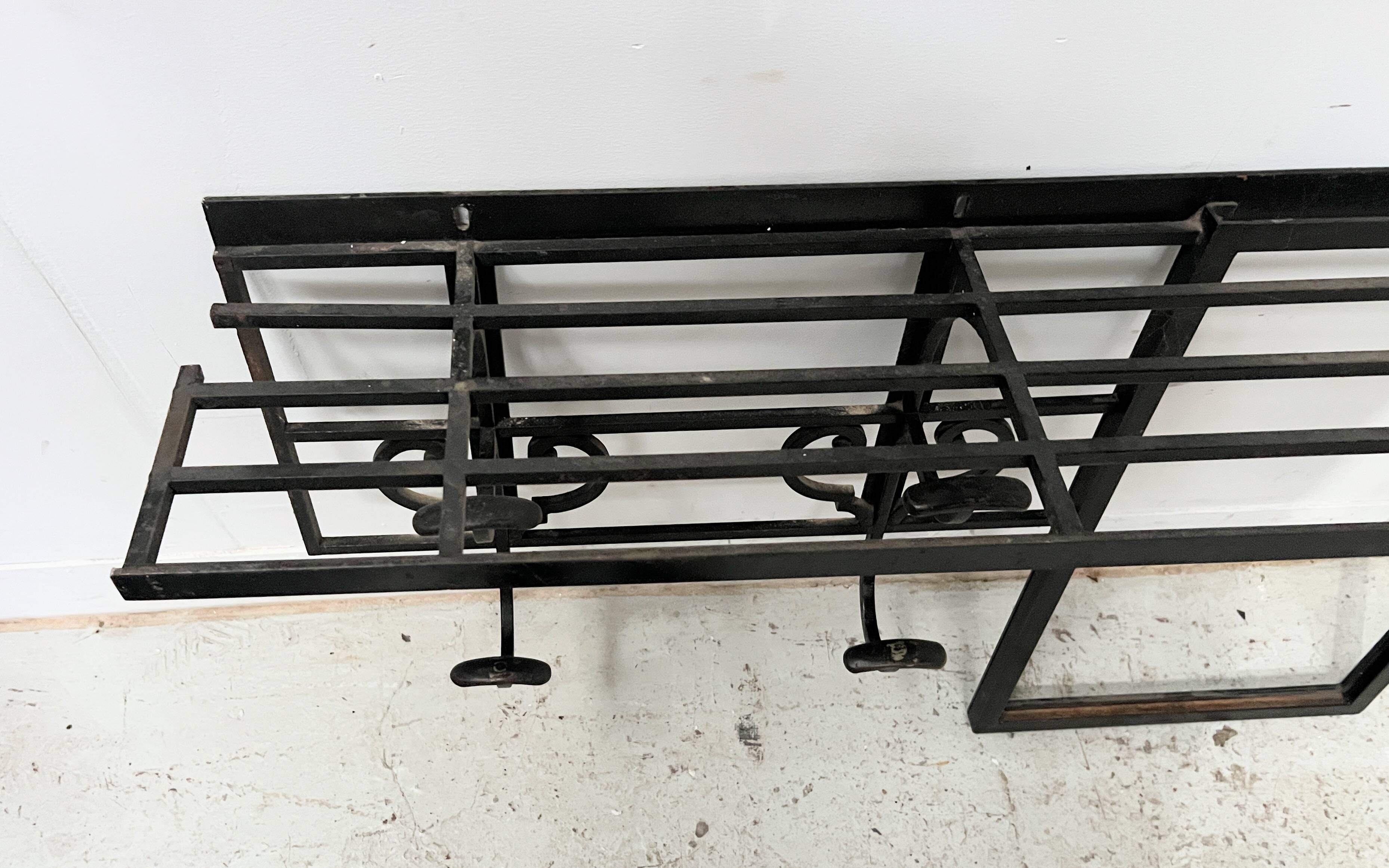 Art Deco wall coat rack in hammered wrought iron, 20th century.