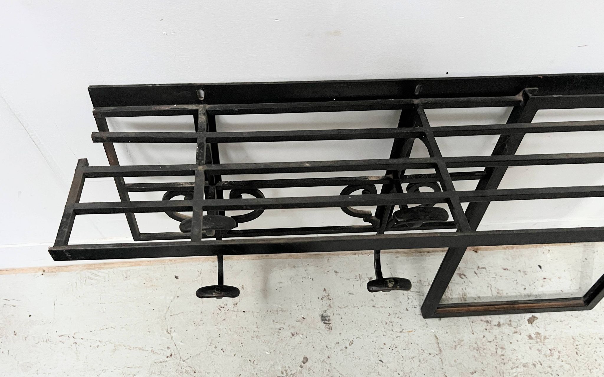 Art Deco wall coat rack in hammered wrought iron, 20th century.