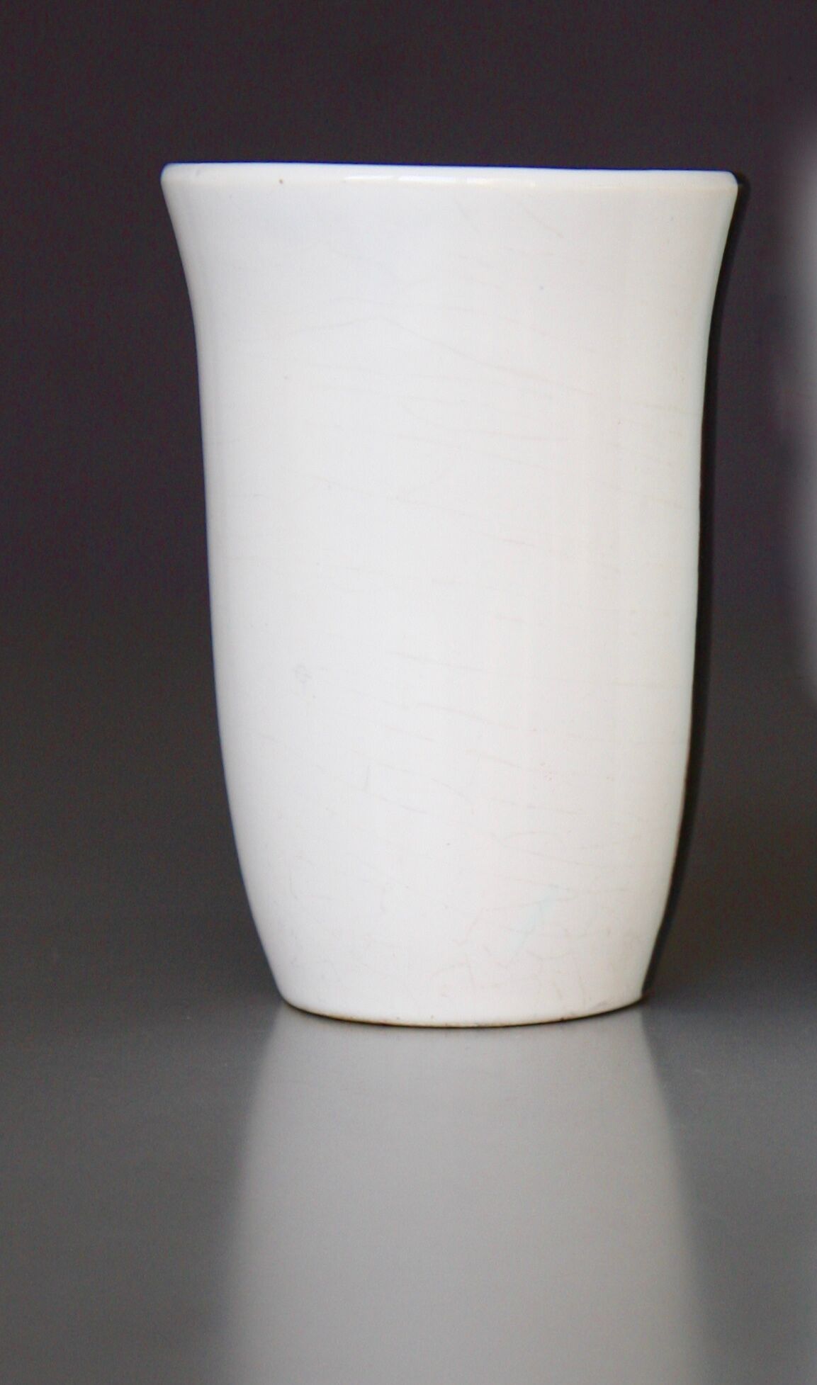 Two-tone porcelain vase, metallic black and white