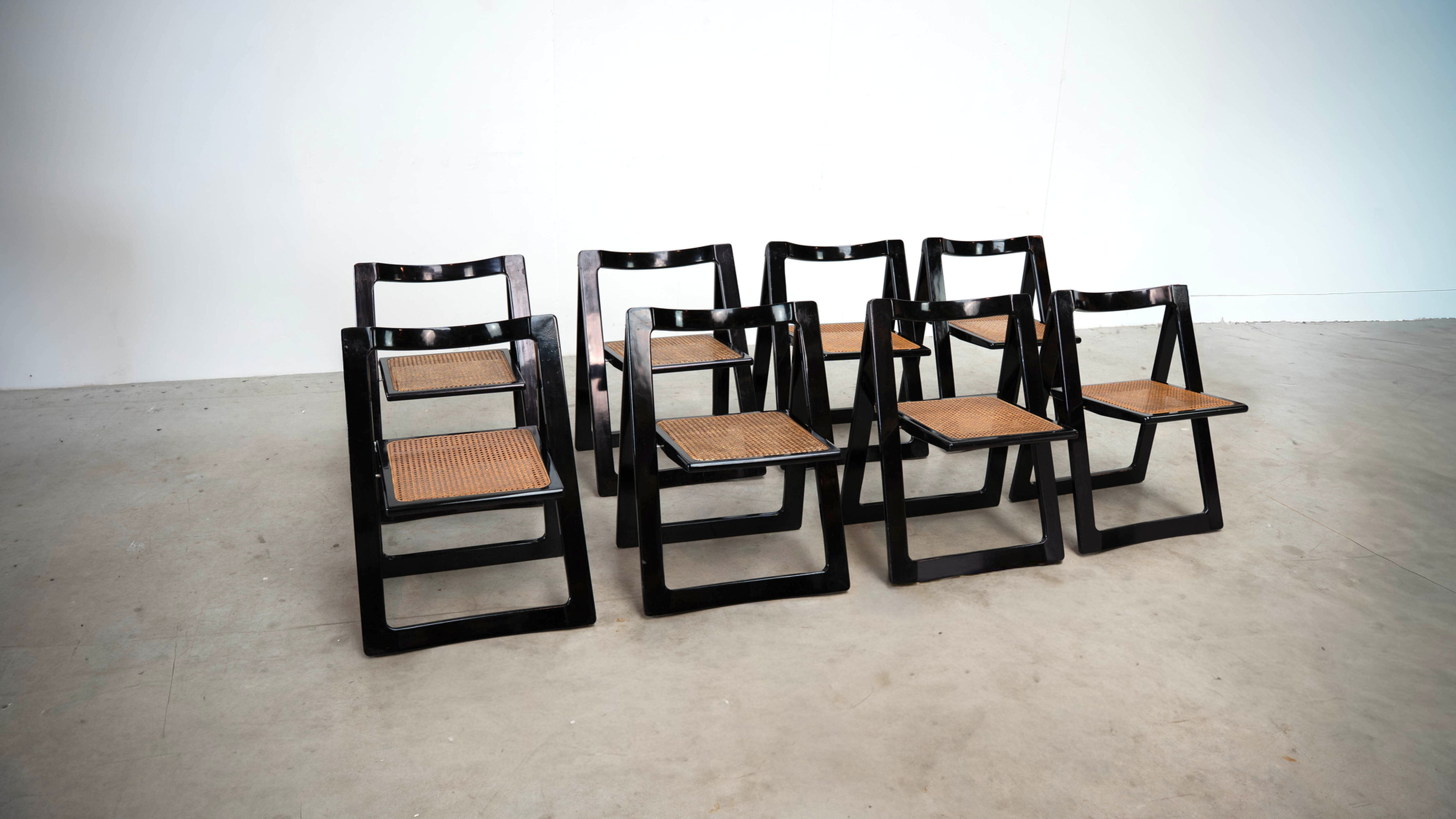 Set of eight folding dining chairs designed by Aldo Jacober for Alberto Bazzani