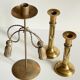 Trio of vintage knotted candlesticks brass