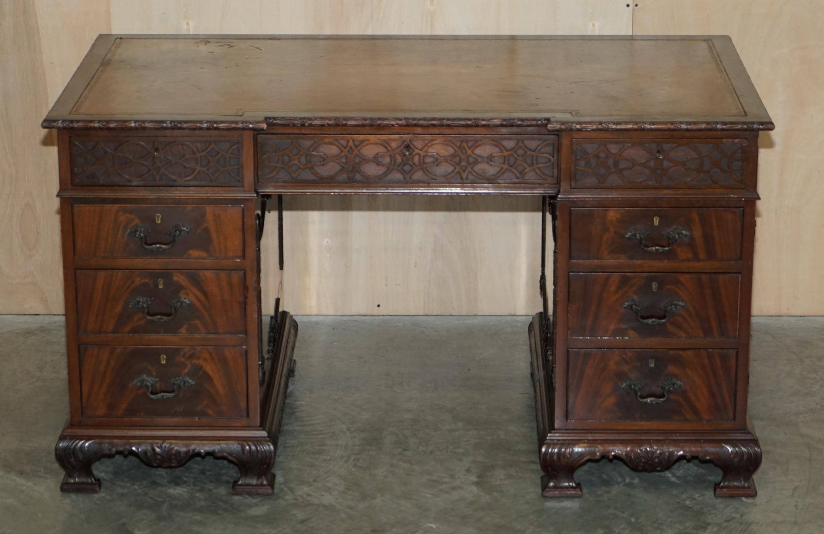 Thomas Chippendale Revival desk with a leather top