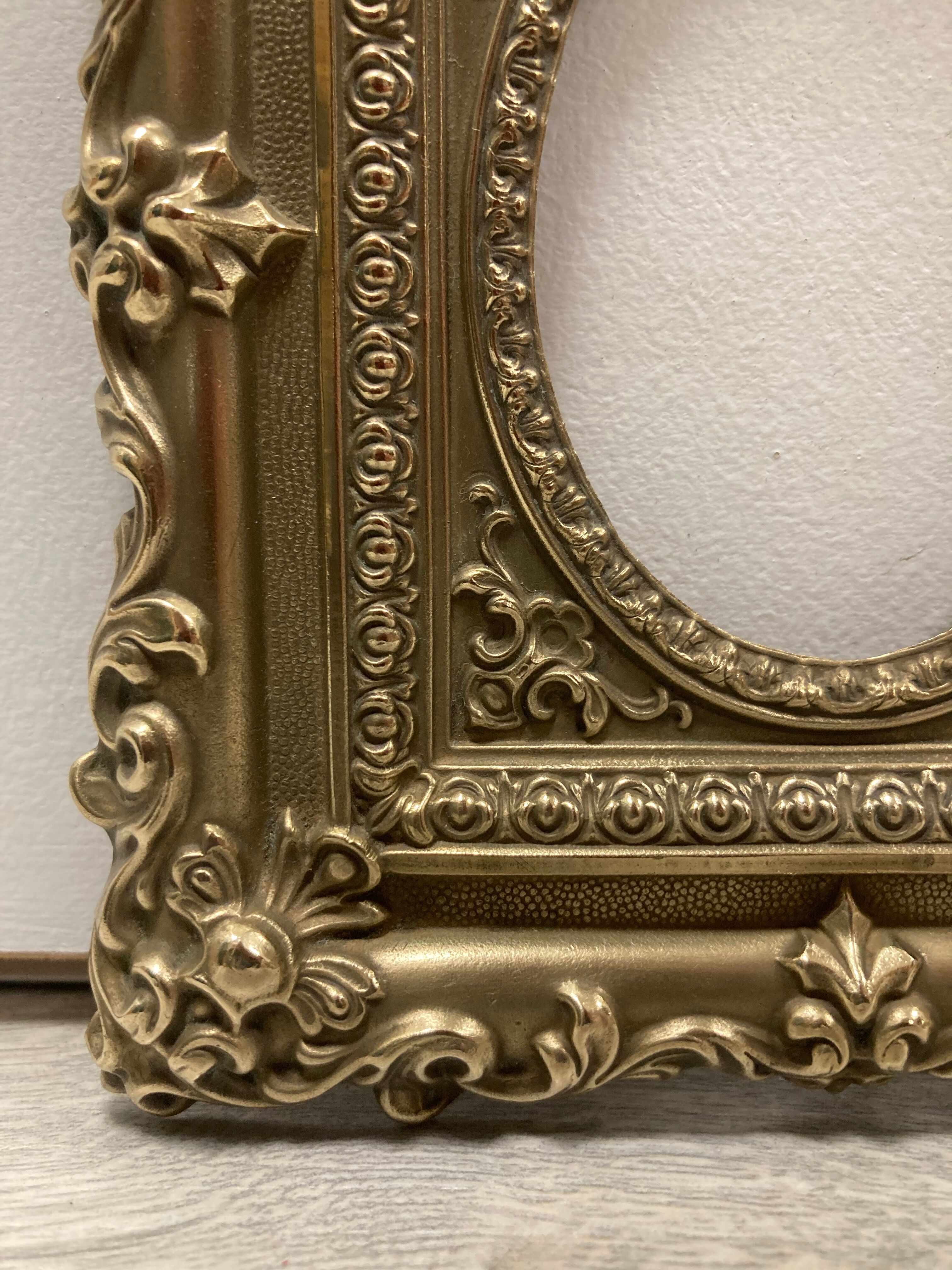 Pair of brass photo frames