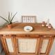 Classic vintage buffet with 3 doors in wood and raffia.