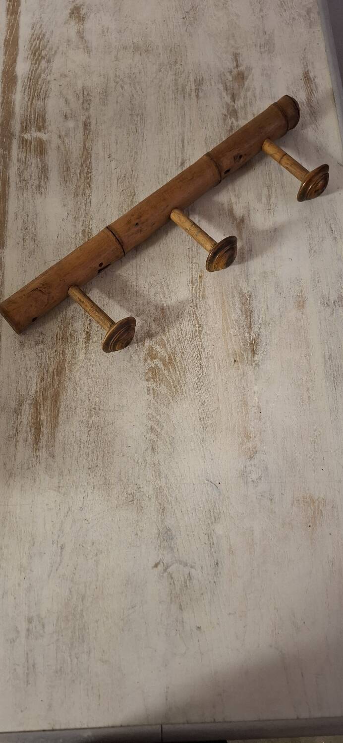 Turned wooden coat rack.