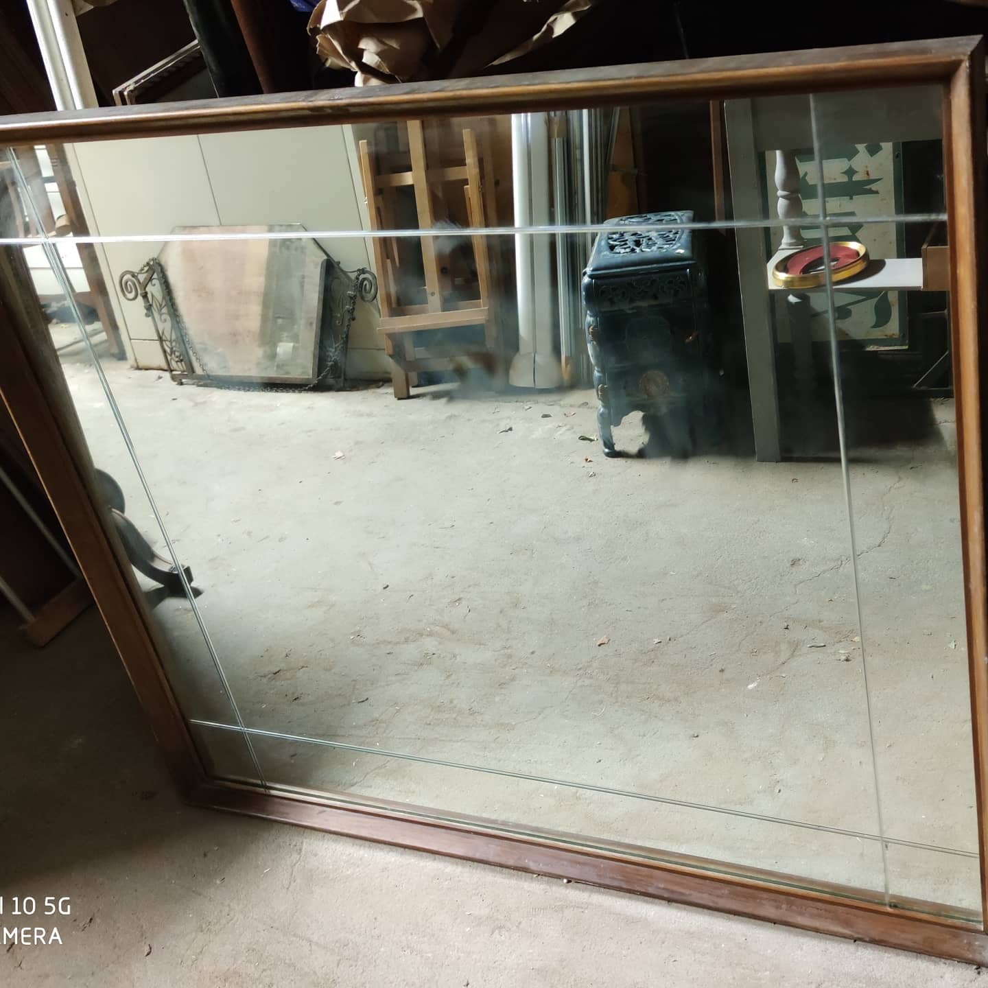 Charming Parisian bistro mirror with wheel-clading work 125x105cm
