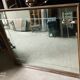 Charming Parisian bistro mirror with wheel-clading work 125x105cm