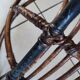 Rattan and metal shell armchair