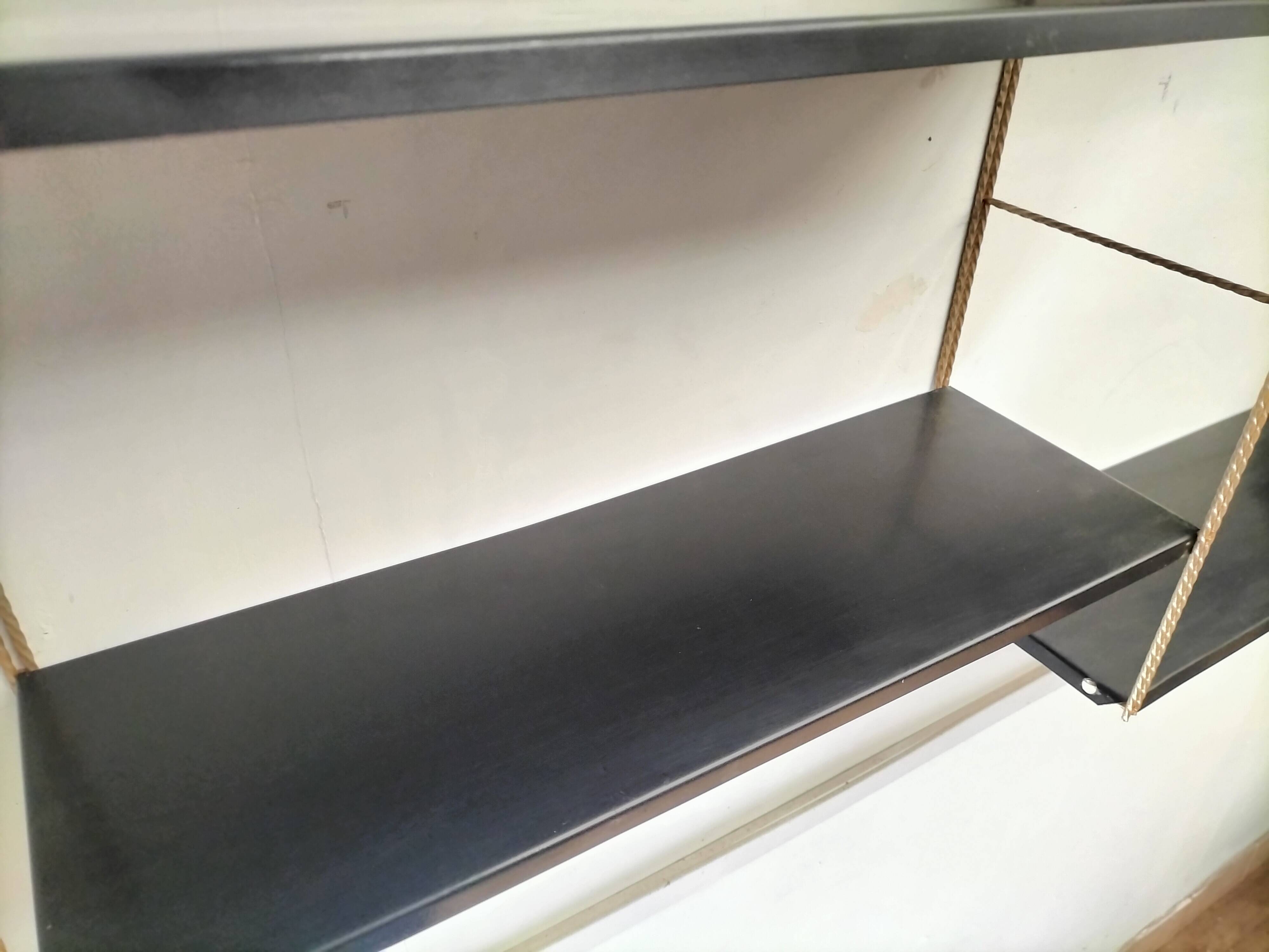 Modular black metal shelf