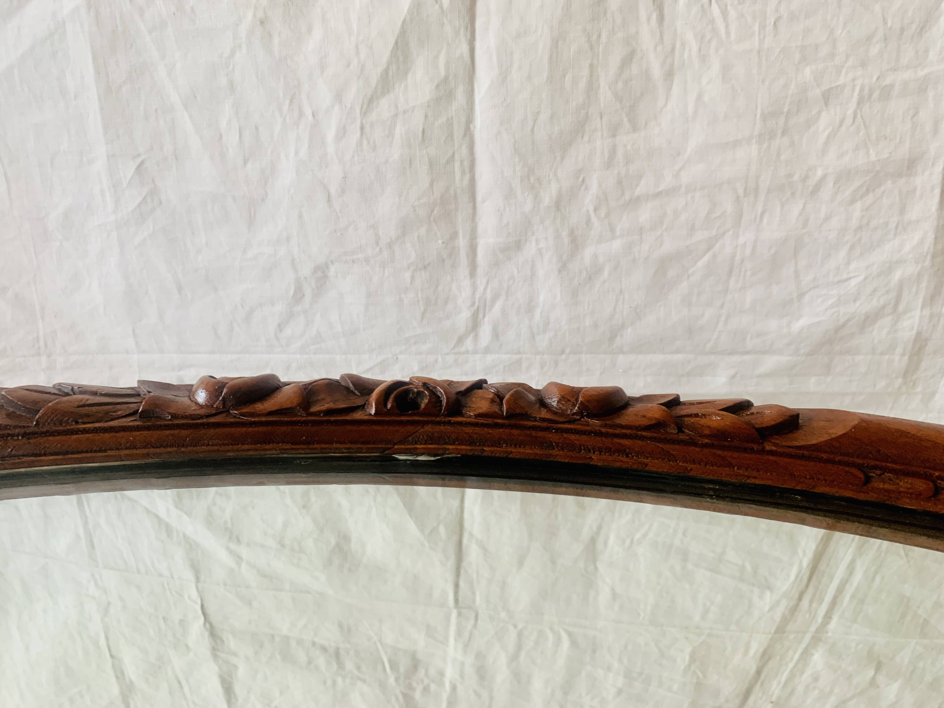 Large Art Deco oval mirror in carved wood - 87 x 53 cm