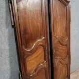 Pair of Louis XV period molded doors in solid walnut