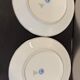 Two Raynaud Limoges plates and Tetard brothers silver.