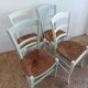 Suite de 4 chaises en bois et paille