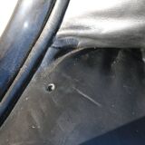 Pollock black leather reclining armchair with fixed ends