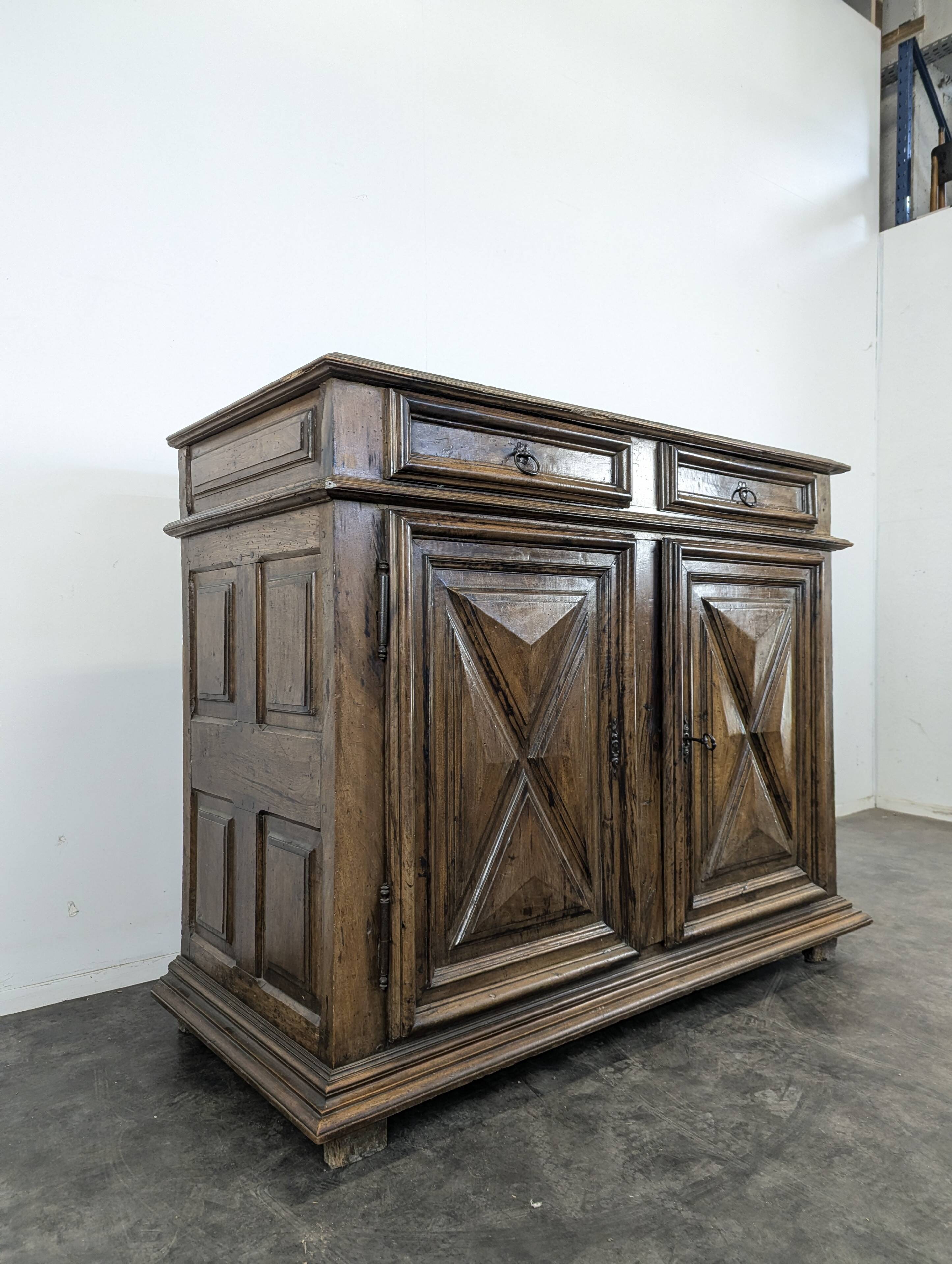High walnut buffet from the Louis XIV period, late 17th century.
