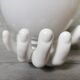 White ceramic hand wall lamp