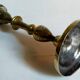 Duo of solid brass and gold metal candle holders worked old