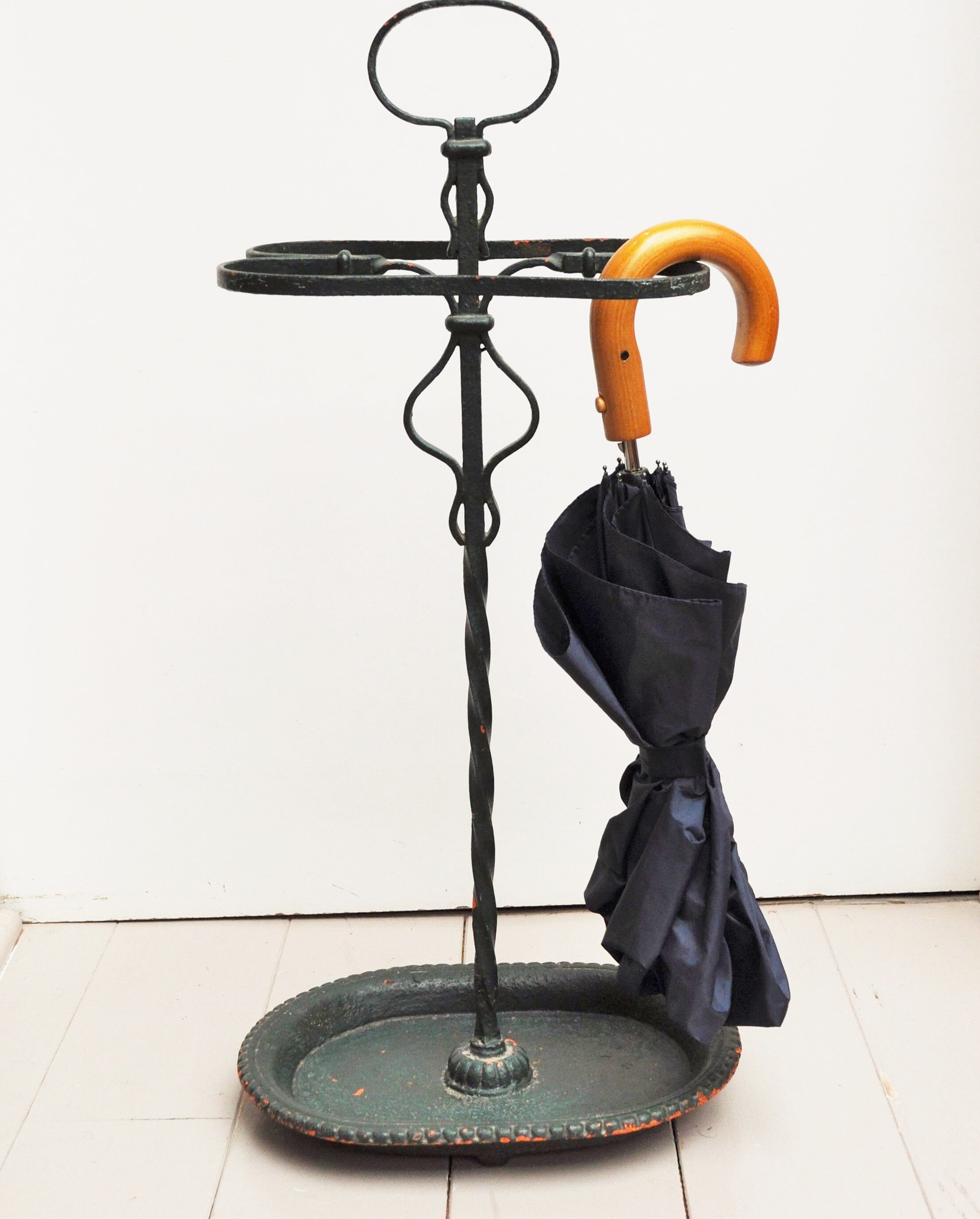 Wearing dark green metal 50s umbrella