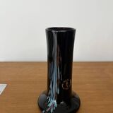 Artisanal vase in black glass with copper and blue inclusions.