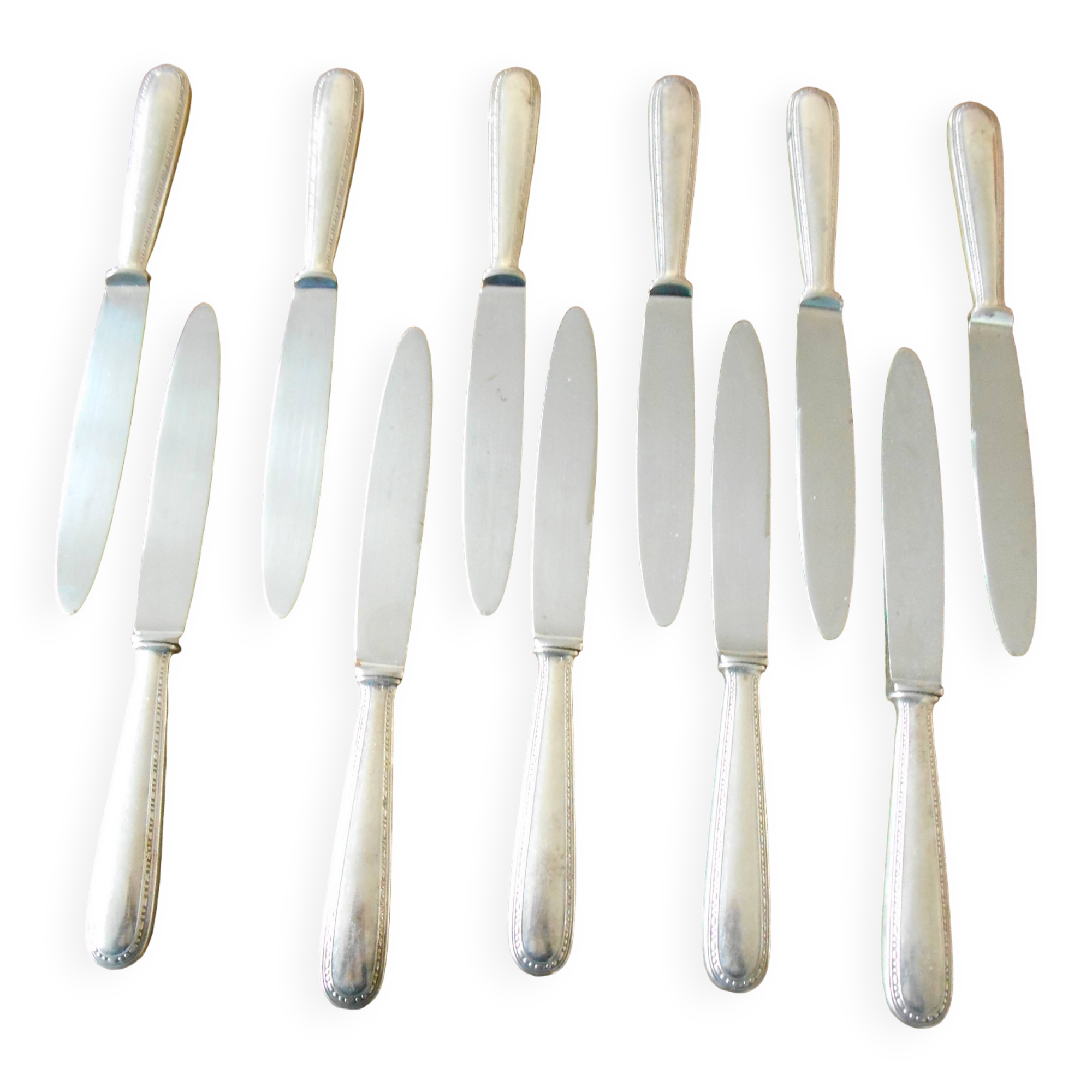 11 silver metal knives