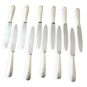 11 silver metal knives
