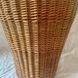 Old woven wicker umbrella stand