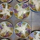 Set of 12 antique earthenware plates in slip with grapes and vines