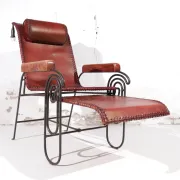 French art deco lounge chair in wrought iron and leather with footrest