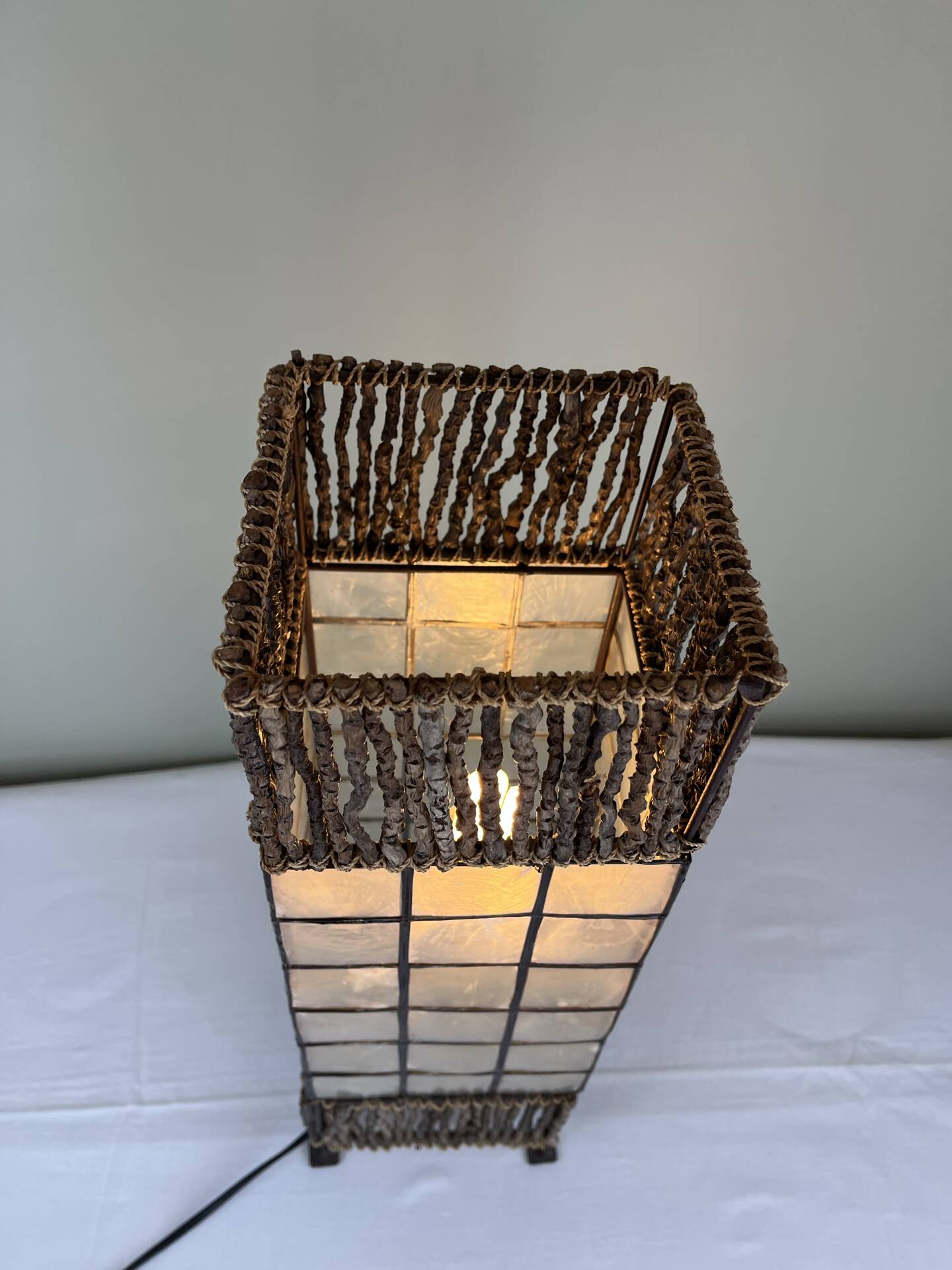 Capiz shell lamp and woven twigs