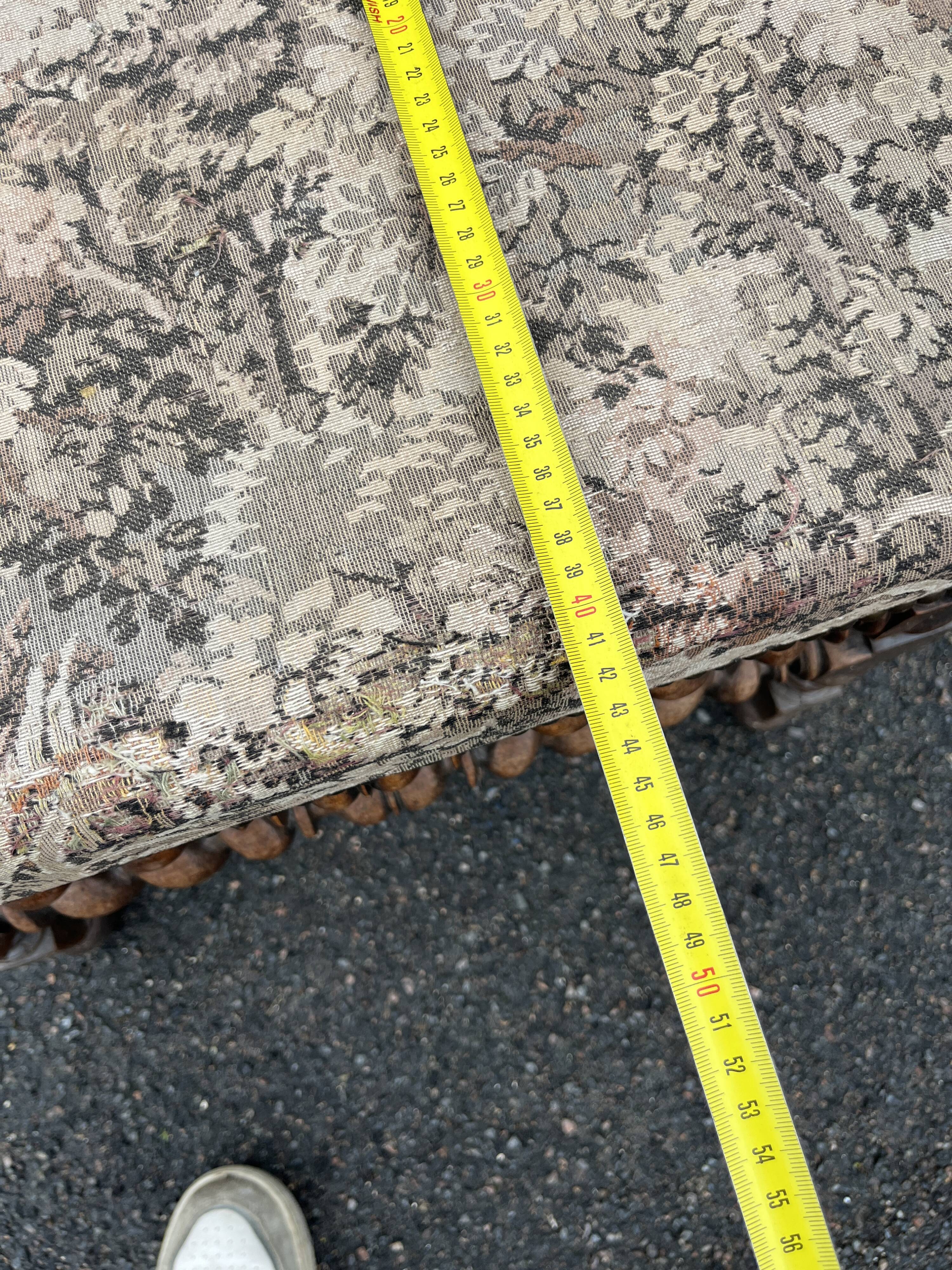 Louis XIII style armchair with twisted backrest and legs.