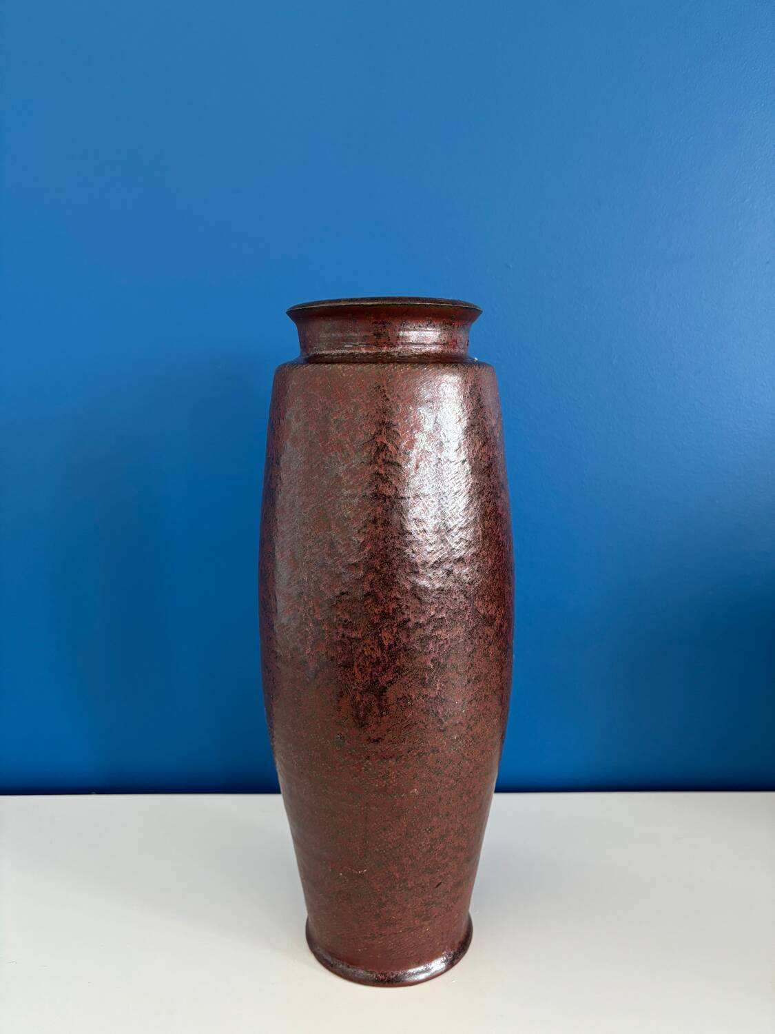 Large textured dark ceramic vase