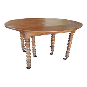 Round wooden table with 3 extensions