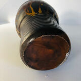 Metallic brown ceramic torso vase