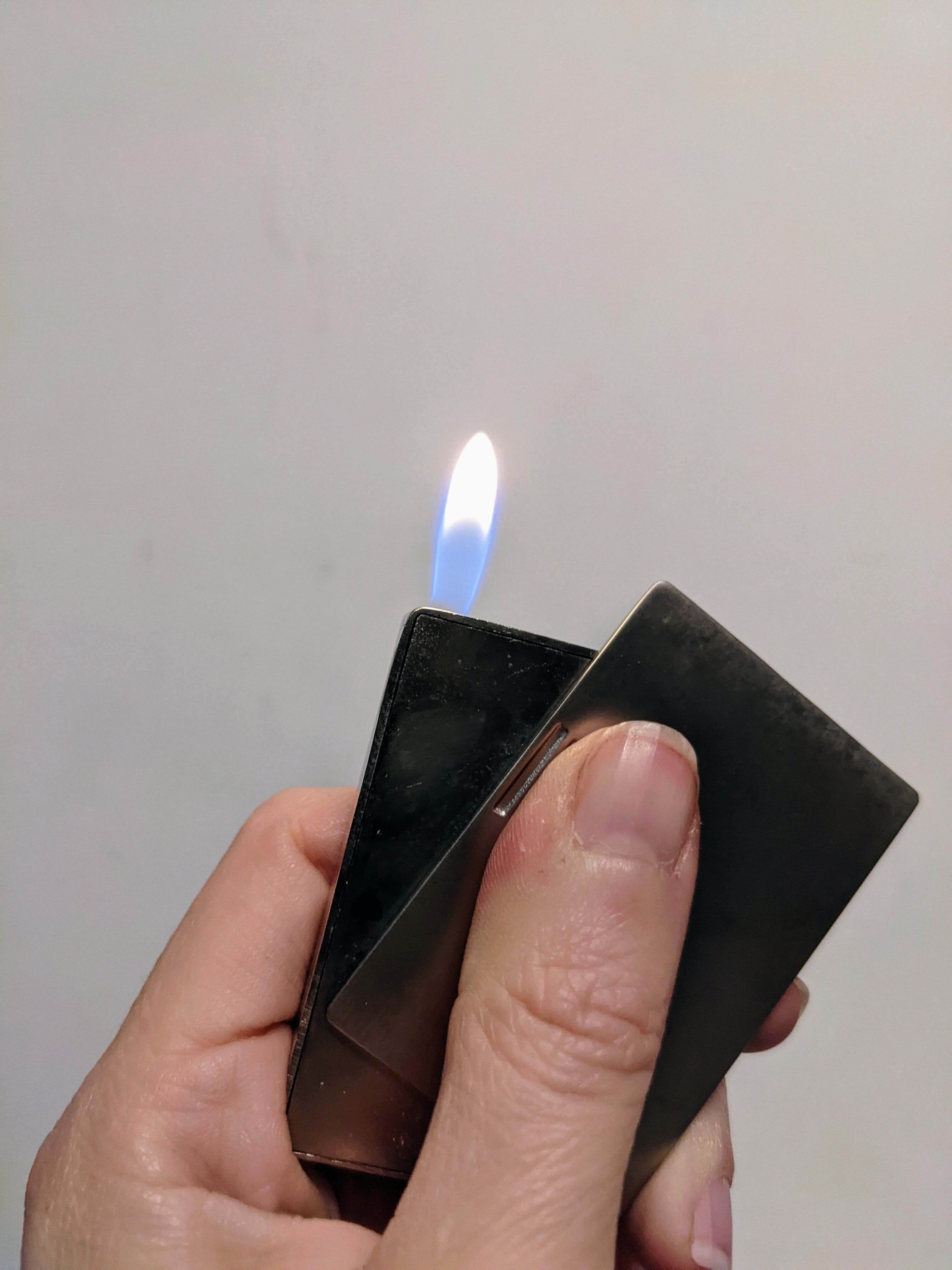 Old lighter new picoflam new condition in its small pocket leather case some stains on the et