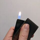 Old lighter new picoflam new condition in its small pocket leather case some stains on the et
