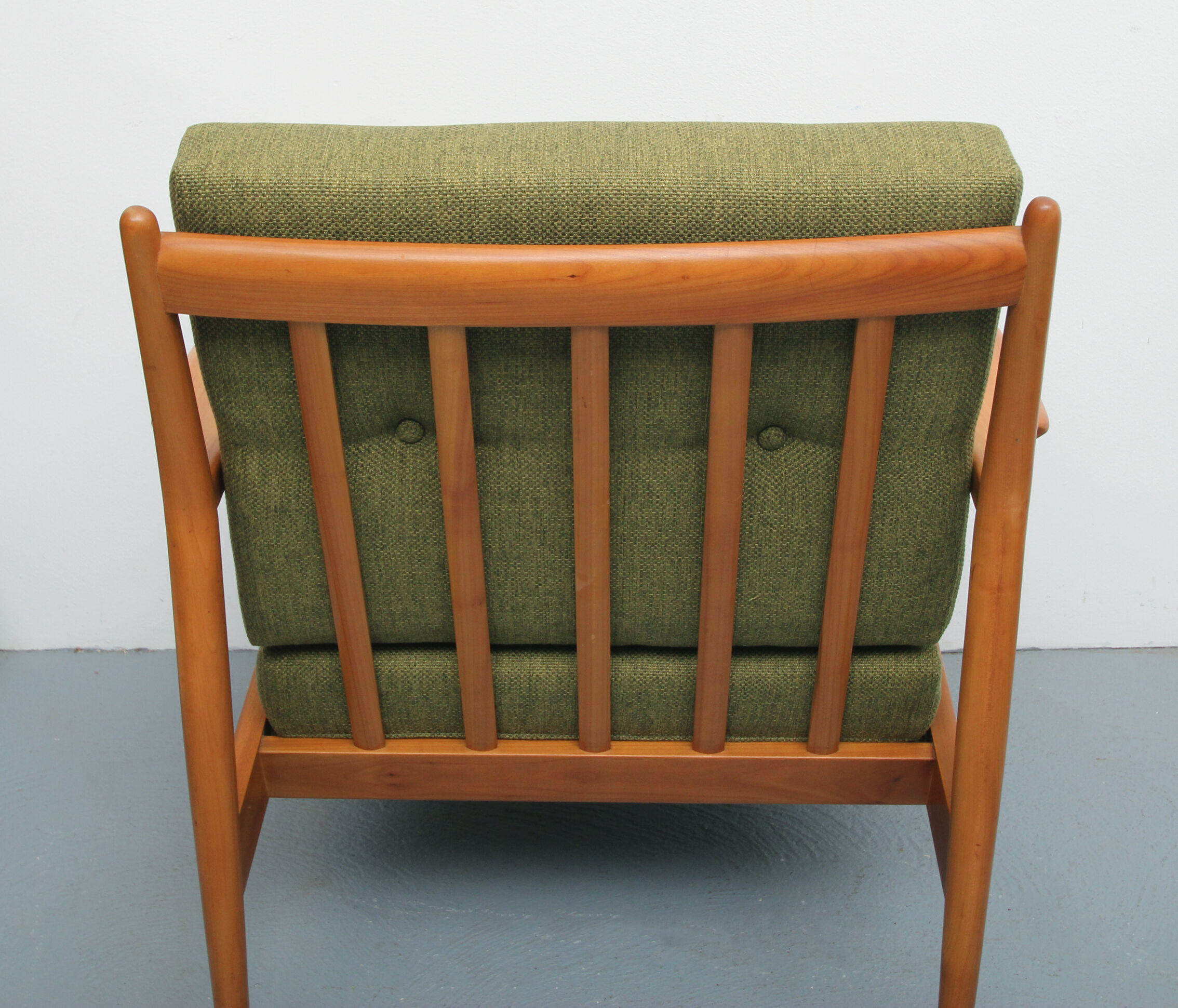1960s armchair in cherrywood, new cushions in green