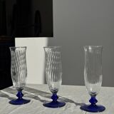 Set of 6 blue-footed champagne flutes; 3 pairs of designs.