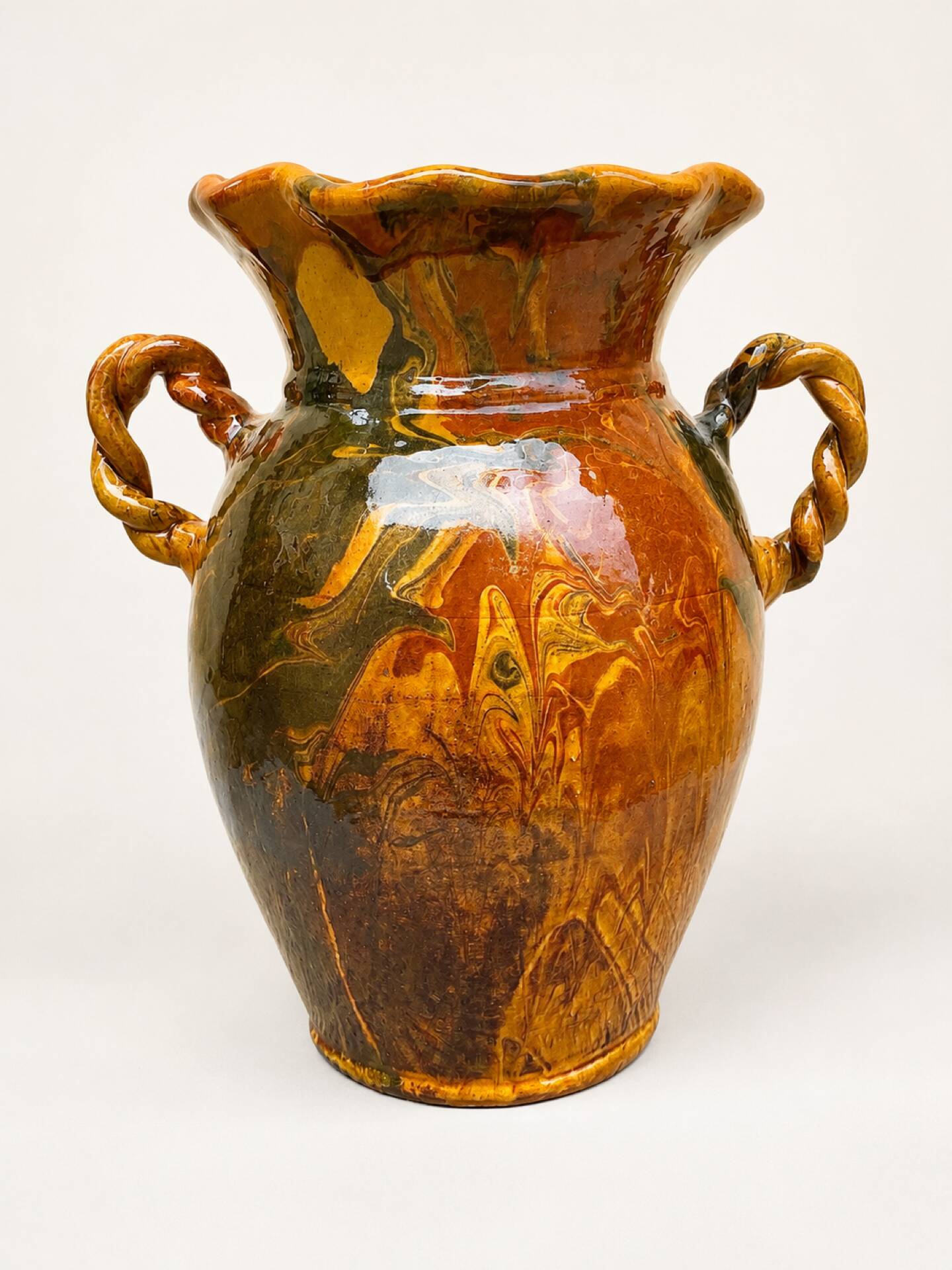 Ancient large vase in glazed speckled terracotta