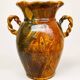 Ancient large vase in glazed speckled terracotta